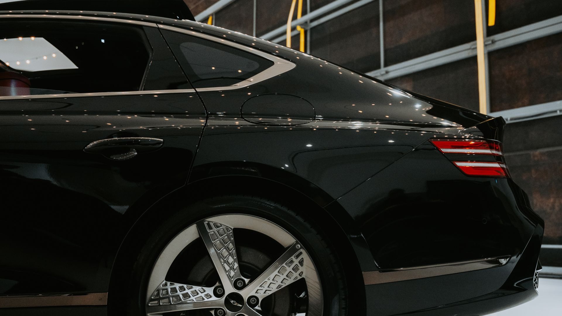Black luxury car with ceramic gloss reflections